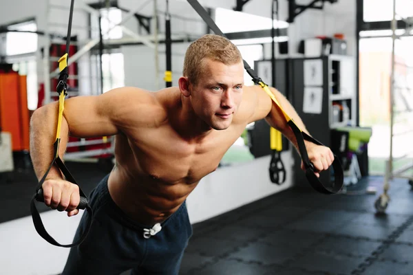 Athlete during a suspension training