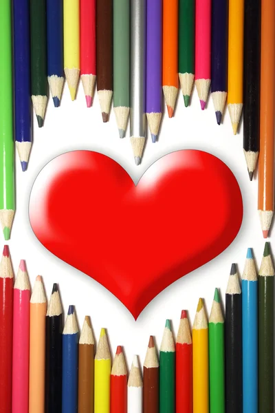 Red heart with pencils