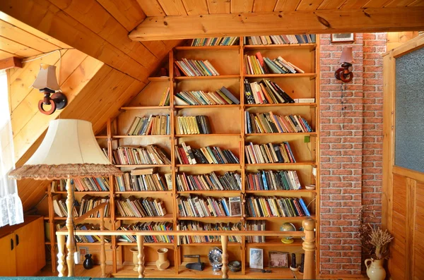 Gdansk, Poland - July 14, 2015: Books room with lamp in old house