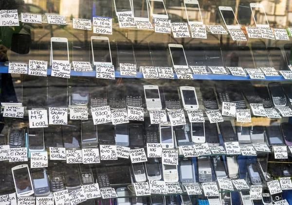 Lots of phones and smartphones exposed in a local shop