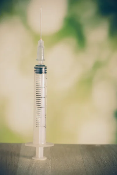 Syringe with filter effect retro vintage style