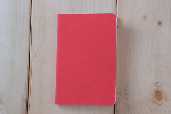 Recycled paper book on wooden background