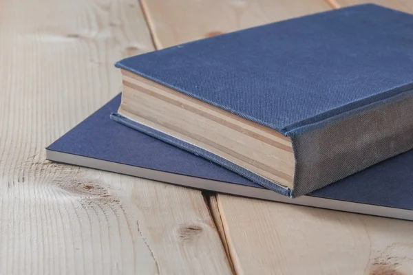 Recycled paper book on wooden background