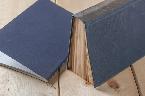 Recycled paper book on wooden background