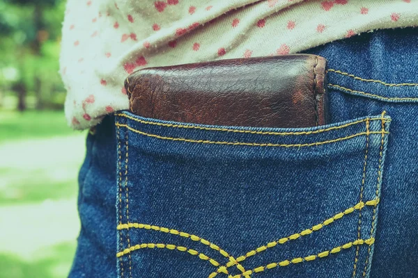 Wallet in back pocket  with filter effect retro vintage style