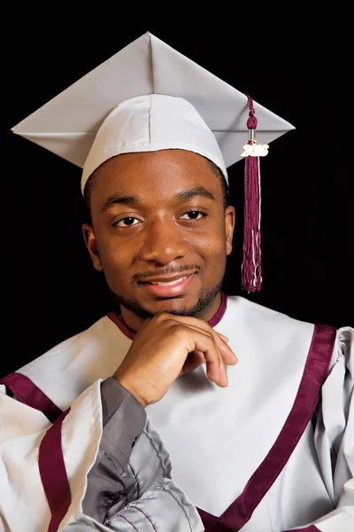 Male Student in Graduation Cap and Gown