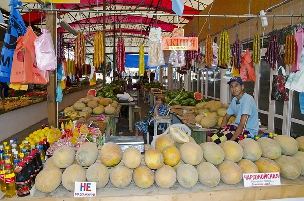 Sellers in indoor vegetable market