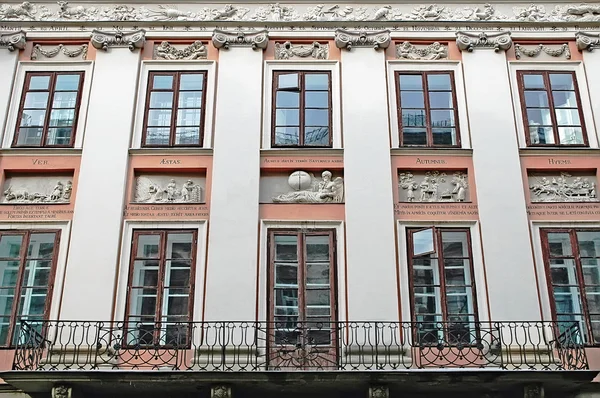 Facade of the building with bas-reliefs