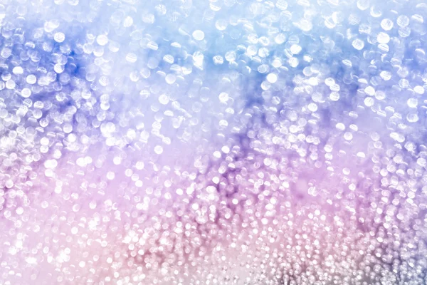 Defocused bokeh. Abstract background white bokeh circles for Christmas and happy new year holiday background.