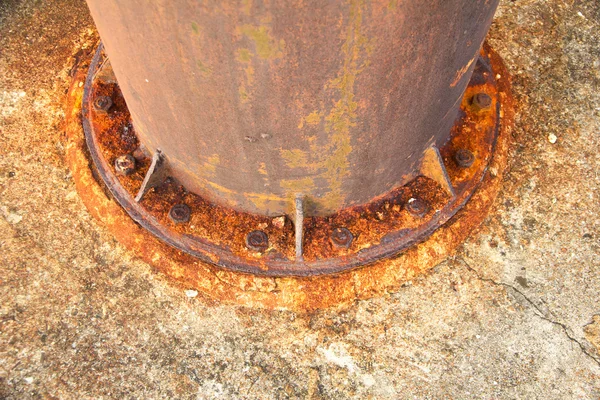 Stock Photo - Old rusty metal nut on iron water valve