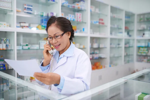 Pharmacist ordering medications for drugstore