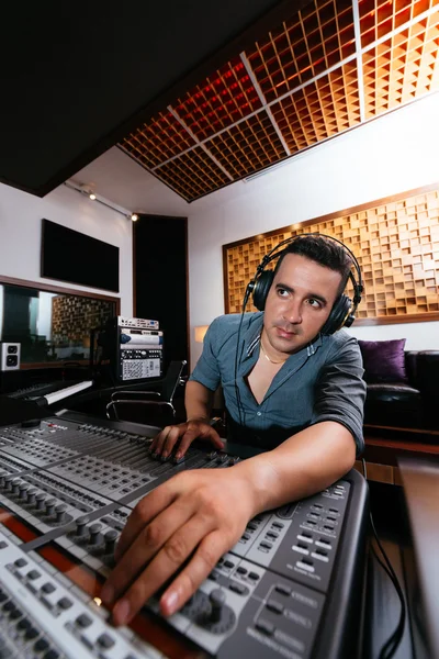 Sound technician in recording studio