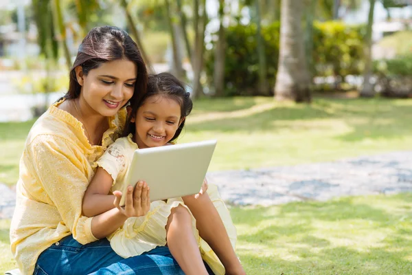 Mother and daughter Using tablet