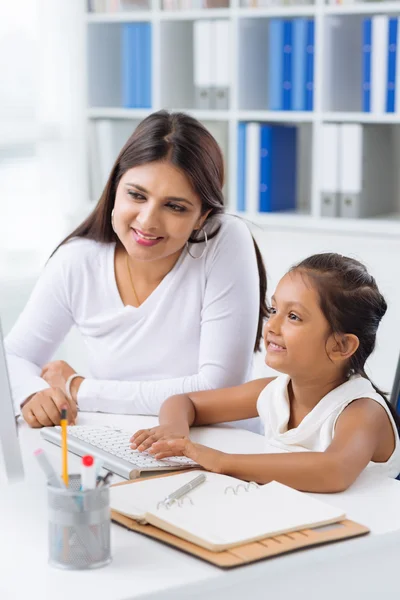 Lady teaching daughter