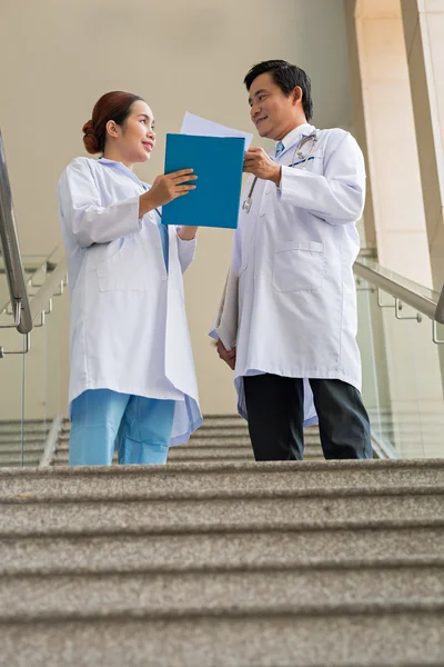 Medical workers on staircase
