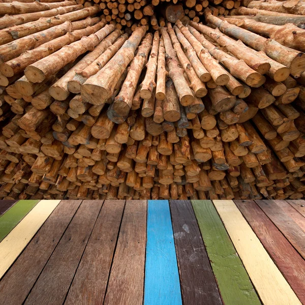 Wood table top on wood stack background montage concept