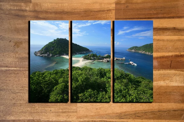 Seascape photo collage frame on wooden background