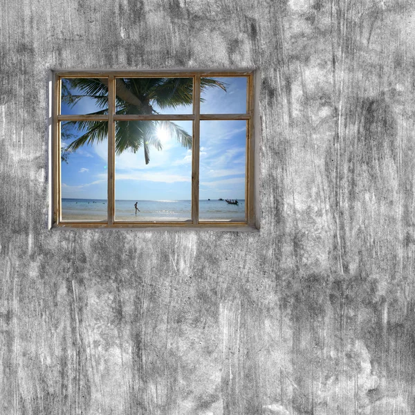 Windows frame on cement wall and view of tropical sea