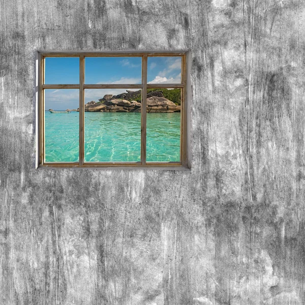 Windows frame on cement wall and view of seascape