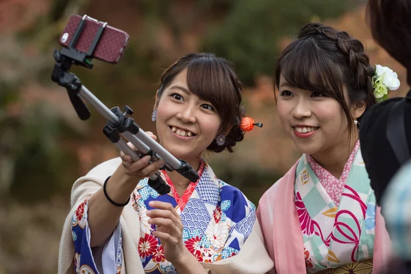 KYOTO, JAPAN - NOV 28, 2015: women in kimono visit the Tofukuji