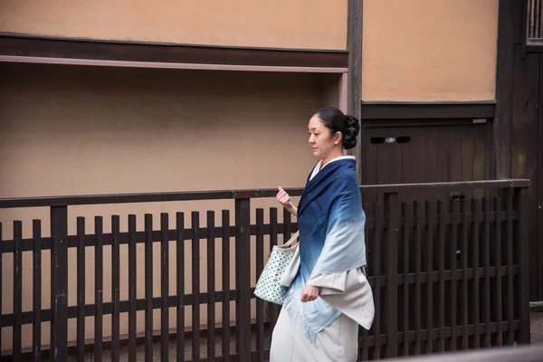 KYOTO, JAPAN - NOV 25: Geisha woman in traditional dress. Kyoto