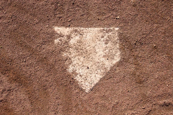 Baseball Homeplate Covered in Dirt