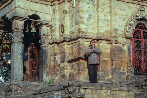 Nepal man praying