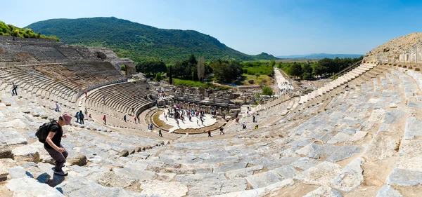 EPHESUS, TURKEY - APRIL 13 : Tourists on Amphitheater (Coliseum) in Ephesus Turkey on April 13, 2015. Ephesus contains the ancient largest collection of Roman ruins in the eastern Mediterranean.