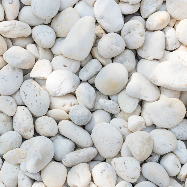 White pebble on the small zen garden ground. Decoration material