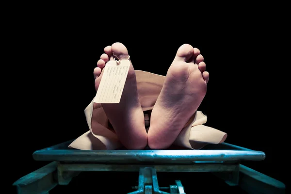 Feet on a morgue table