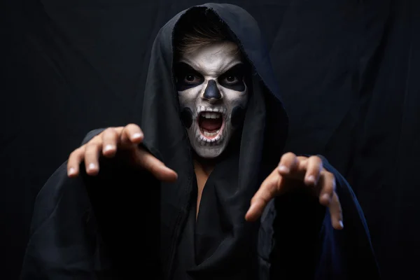 Teen with makeup skull cape wants  grab