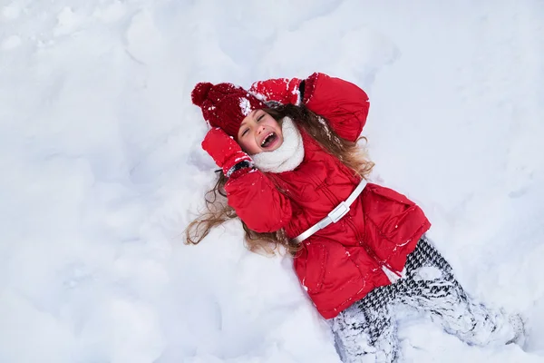 The girl fell into the snow
