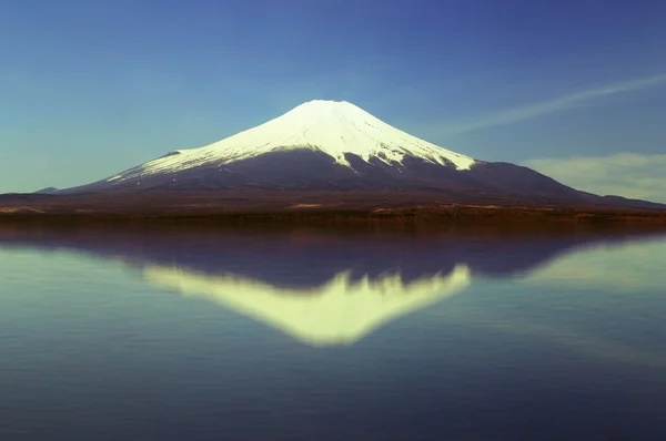View of Mount Fuji with mirror reflection in lake, Japan