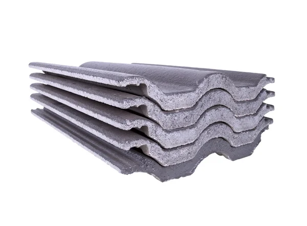 Stack of concrete roof tile (gray color) on white
