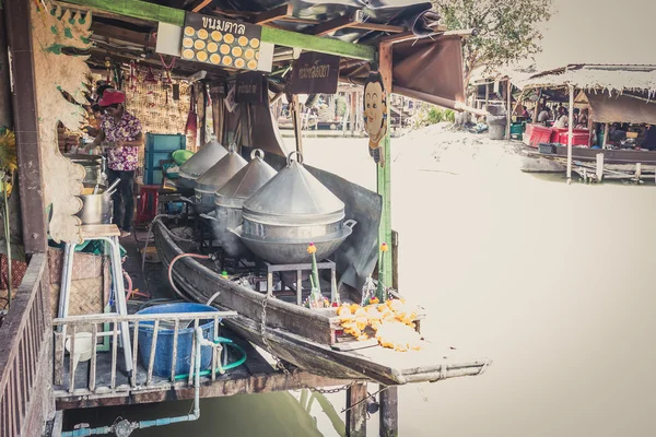 Phra Nakhon Si Ayutthaya, Thailand - April 14, 2015: Ayothaya Floating Market. Has a many visitors, both Thais and foreign visitors with varieties of Thai clothes and Thai food at Ayutthaya,Thailand