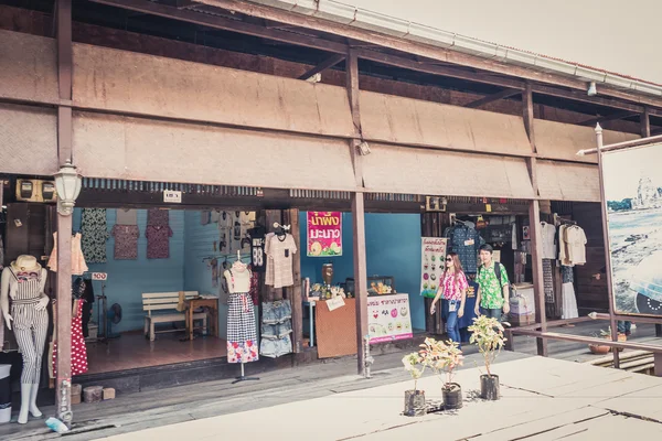 Phra Nakhon Si Ayutthaya, Thailand - April 14, 2015: Ayothaya Floating Market. Has a many visitors, both Thais and foreign visitors with varieties of Thai clothes and Thai food at Ayutthaya,Thailand