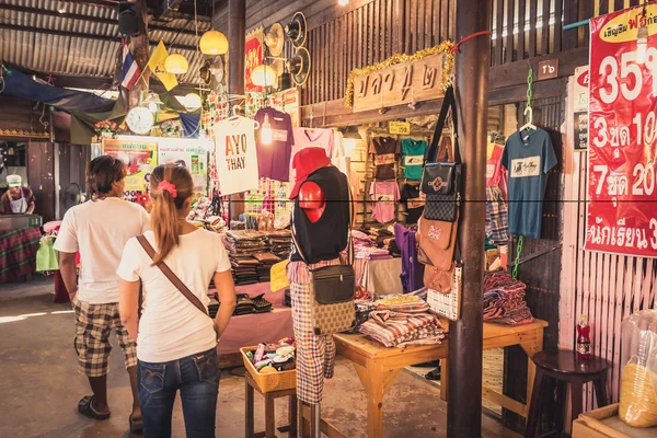 Phra Nakhon Si Ayutthaya, Thailand - April 14, 2015: Ayothaya Floating Market. Has a many visitors, both Thais and foreign visitors with varieties of Thai clothes and Thai food at Ayutthaya,Thailand