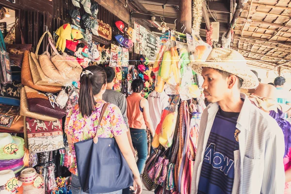 Phra Nakhon Si Ayutthaya, Thailand - April 14, 2015: Ayothaya Floating Market. Has a many visitors, both Thais and foreign visitors with varieties of Thai clothes and Thai food at Ayutthaya,Thailand