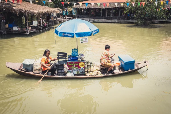 Phra Nakhon Si Ayutthaya, Thailand - April 14, 2015: Ayothaya Floating Market. Has a many visitors, both Thais and foreign visitors with varieties of Thai clothes and Thai food at Ayutthaya,Thailand