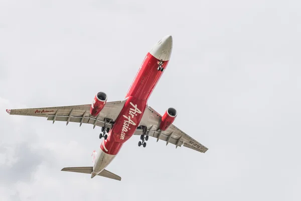 BANGKOK, THAILAND - MAY 20, 2015: HS-XTA  Airbus A330-343 of Thai AirAsia X landing to Don Mueang International Airport Thailand. Thai AirAsia X company is the largest low cost airlines in Asia.