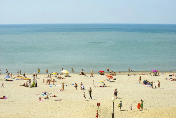 Tourists at the Baltic beach, Russia