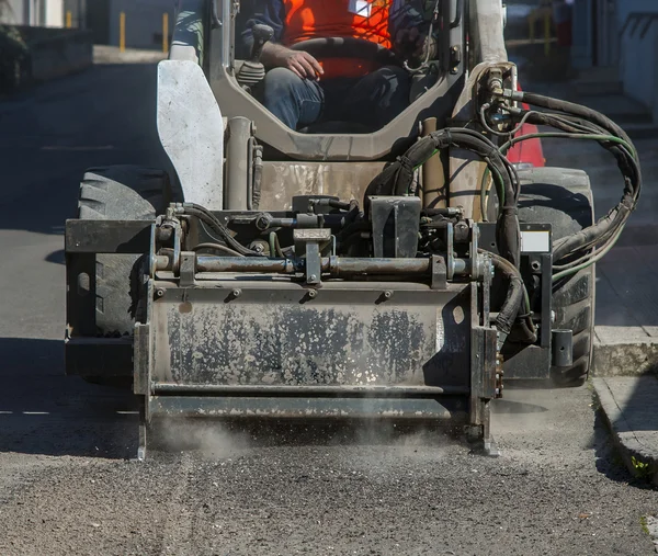 Milling of asphalt for road reconstruction accessory