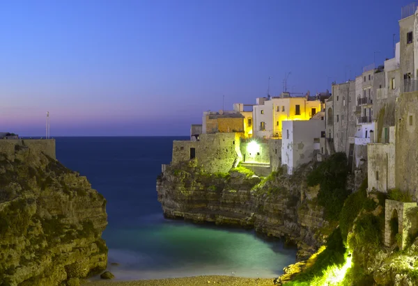 Polignano a Mare at night. Sea and rocks