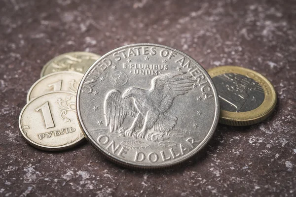 Metal coins, dollars, rubles, euros