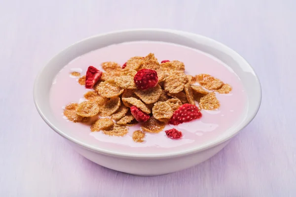 Corn flakes with fruit yogurt and fruit pieces