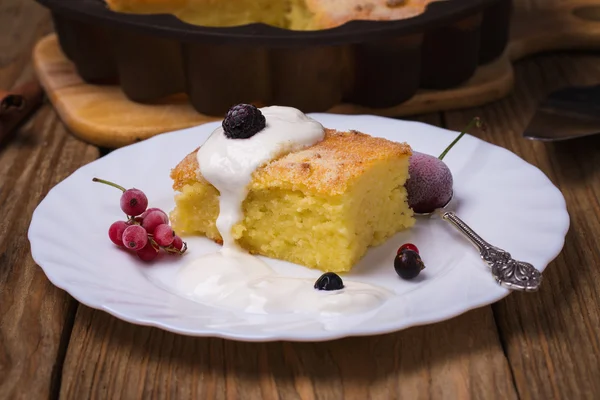 Freshly baked pudding with berries, closeup