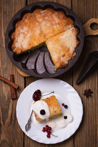 Freshly baked pudding with berries, top view