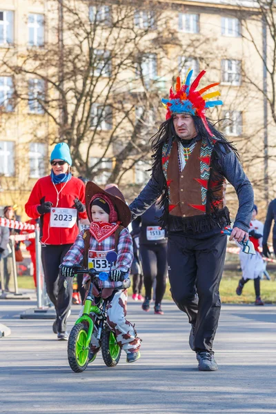 Krakow, Poland - December 31, 2015: 12th New Year\'s Eve Race in Krakow. The people running dressed in funny costumes