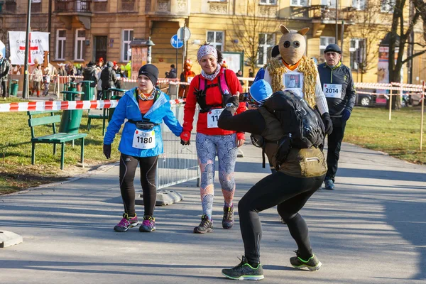 Krakow, Poland - December 31, 2015: 12th New Year\'s Eve Race in Krakow. The people running dressed in funny costumes