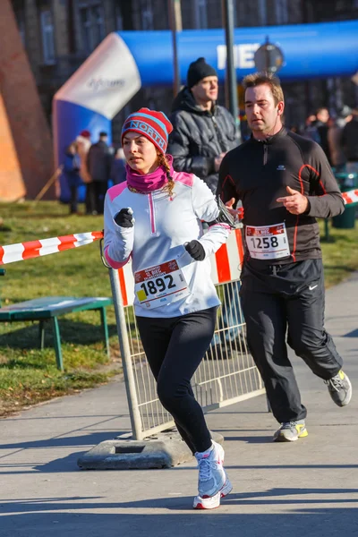 Krakow, Poland - December 31, 2015: 12th New Year\'s Eve Race in Krakow. The people running dressed in funny costumes